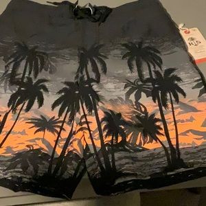 NWT men’s swimming trunks. Never worn.